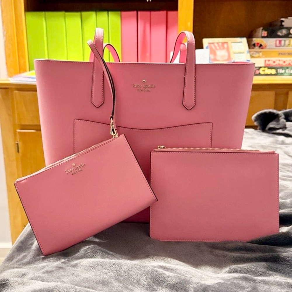 Gorgeous taffy pink Kate Spade tote set.  Tote, wristlet, and zipper pouch NWOT!
